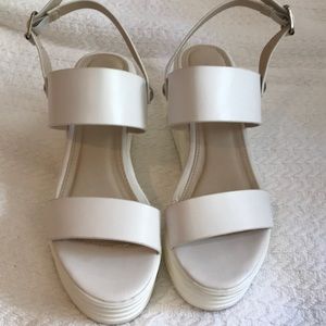 White platform sandals from Nasty Gal